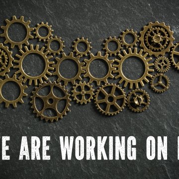 software system optimizers we are working on it small wheels motor parts in the background